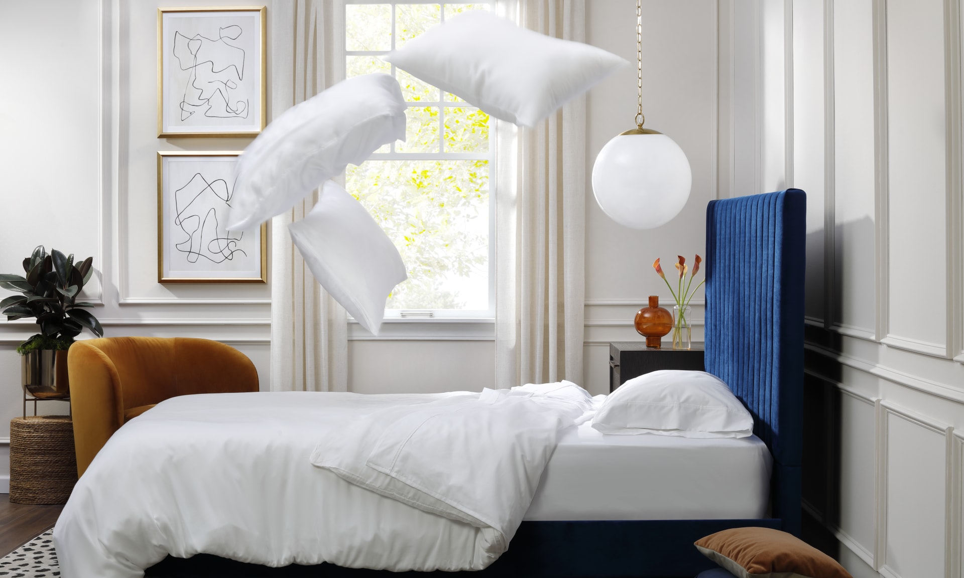 Pillows Flying in air above bed in bedroom
