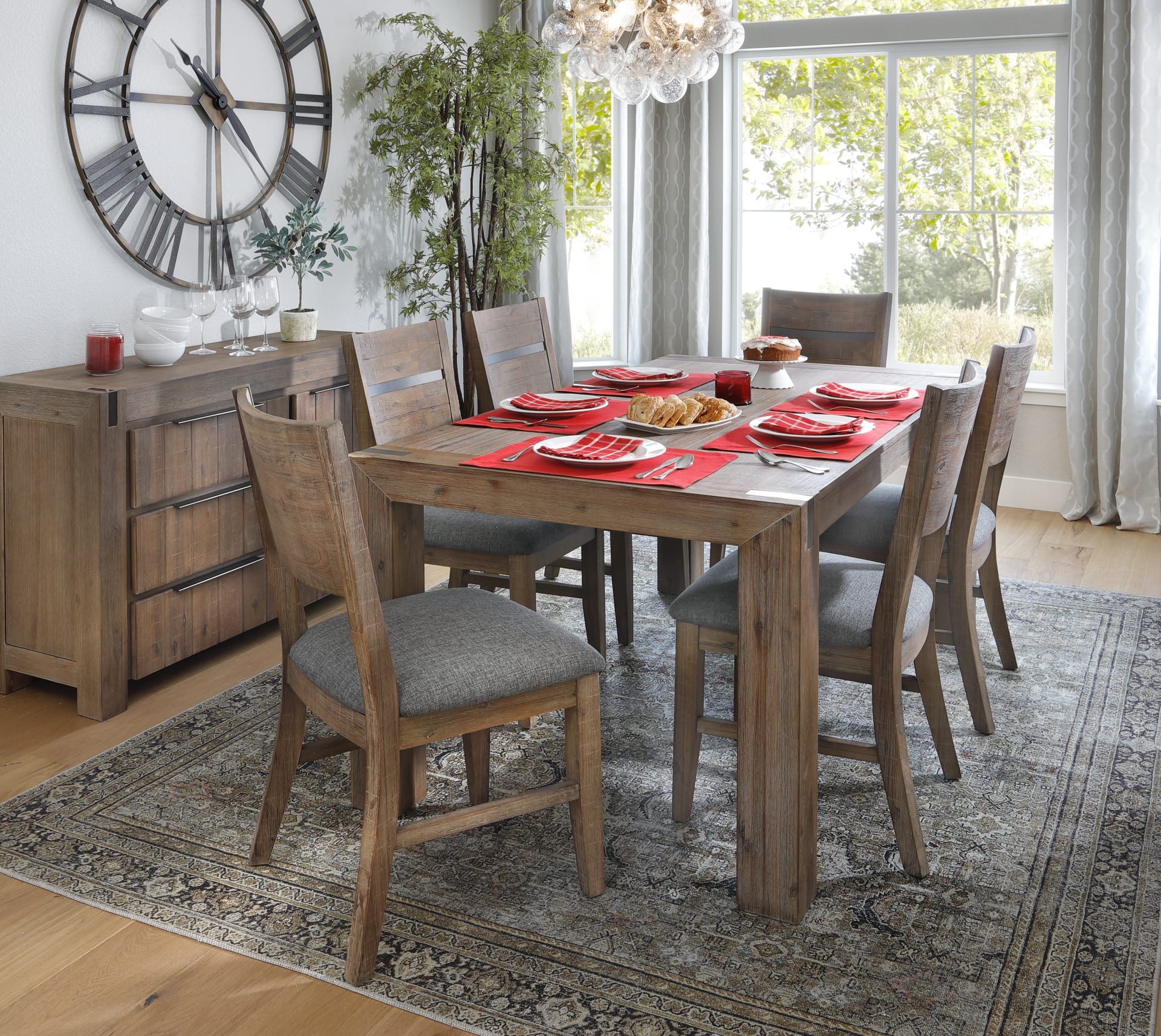 Rustic wood five piece dining set with matching server in dining room window scene