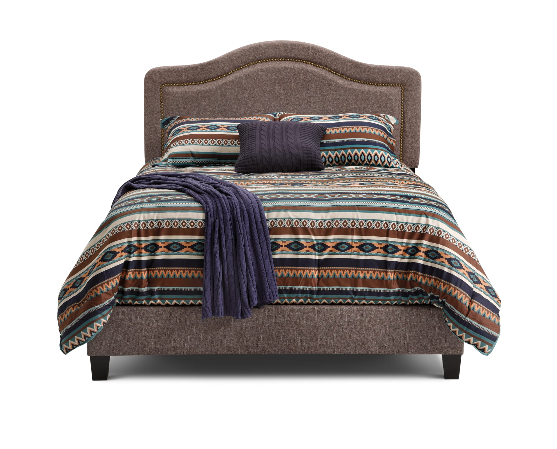 The Torrance Bed with multicolored bedding on a white background