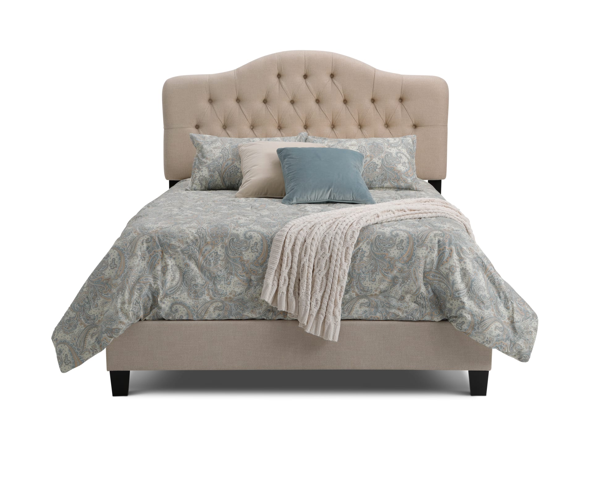 The Redondo Upholstered Bed with paisley bedding on white background