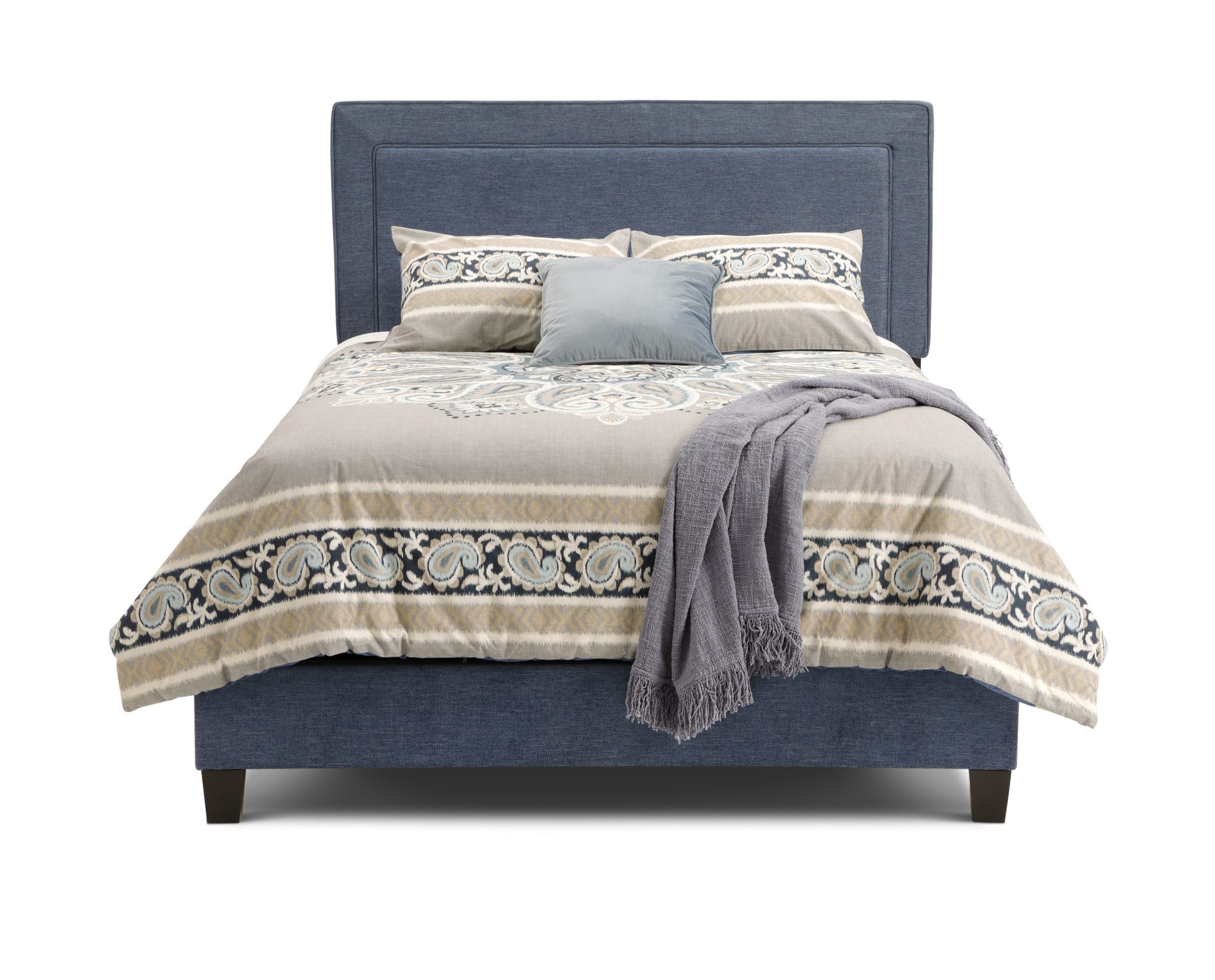 The Manhattan Upholstered Bed with bedding on white background
