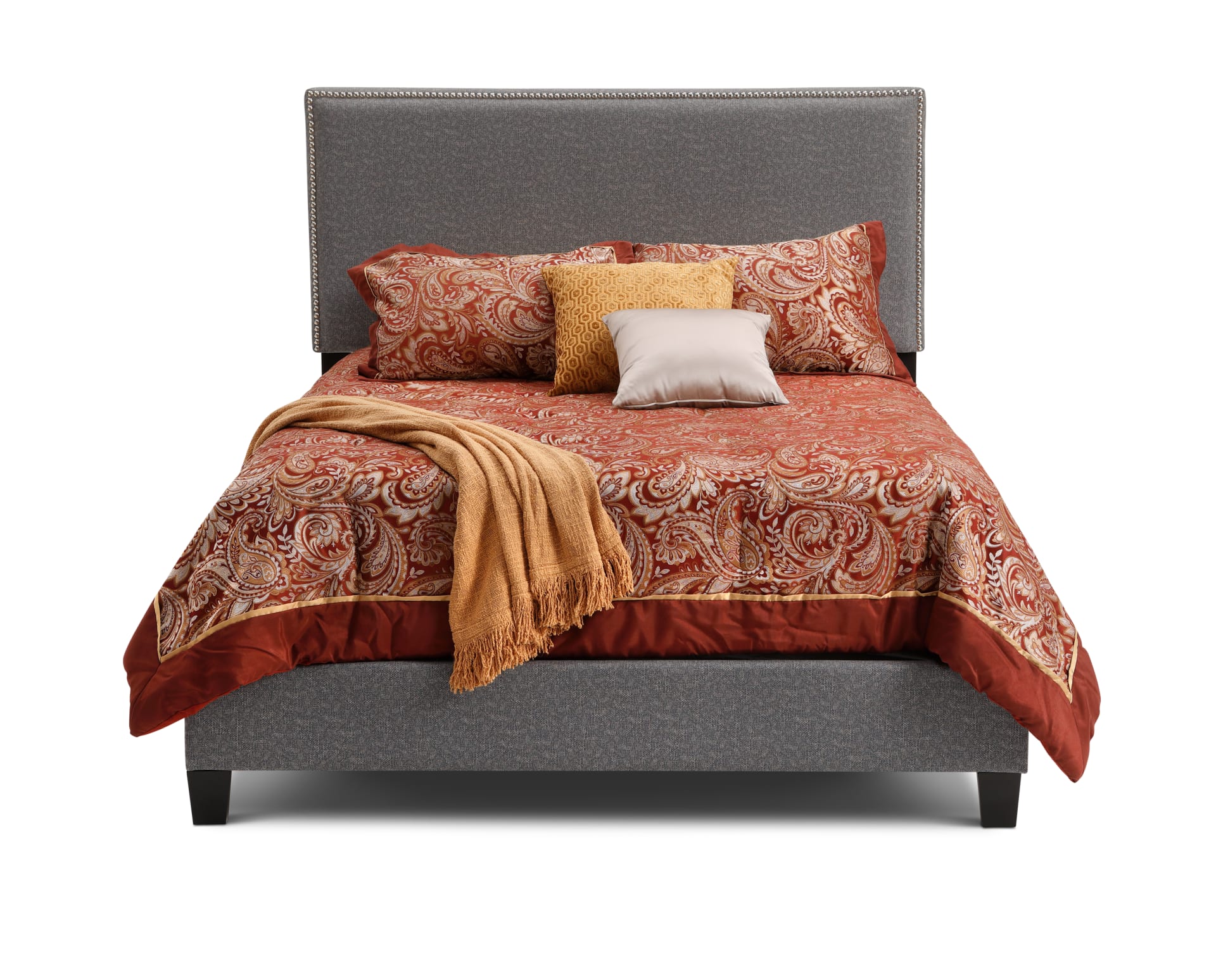 The Delrey Upholstered Bed with red and gold bedding on white background