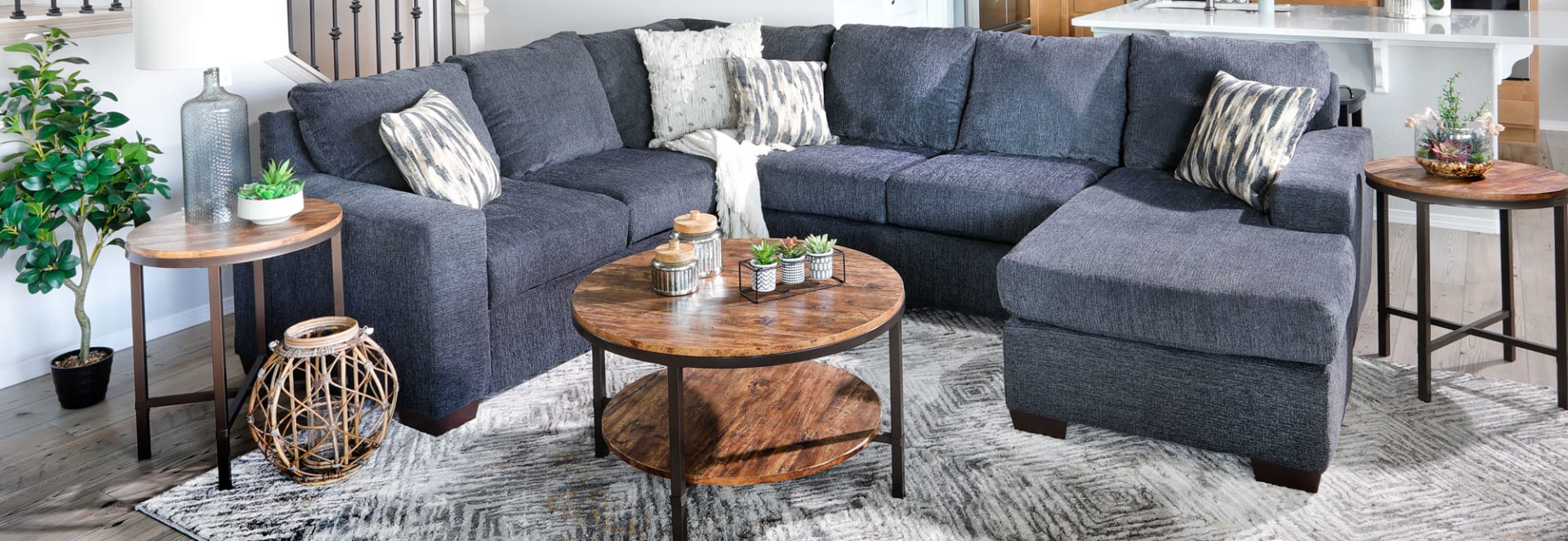Dark Grey to Navy Colored compact sectional with chaise in house