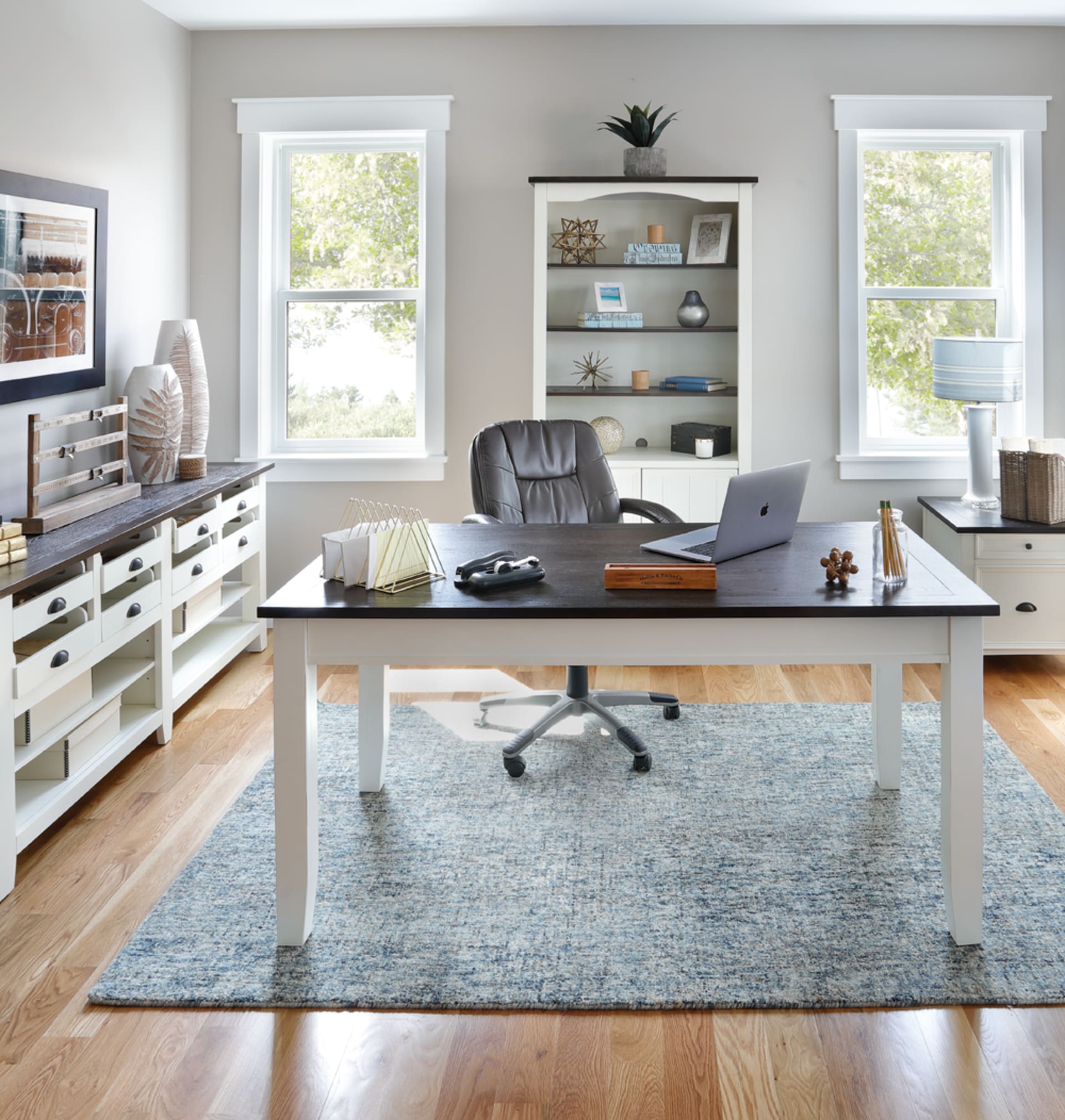 White Desk with Dark wooden Top in sunny office