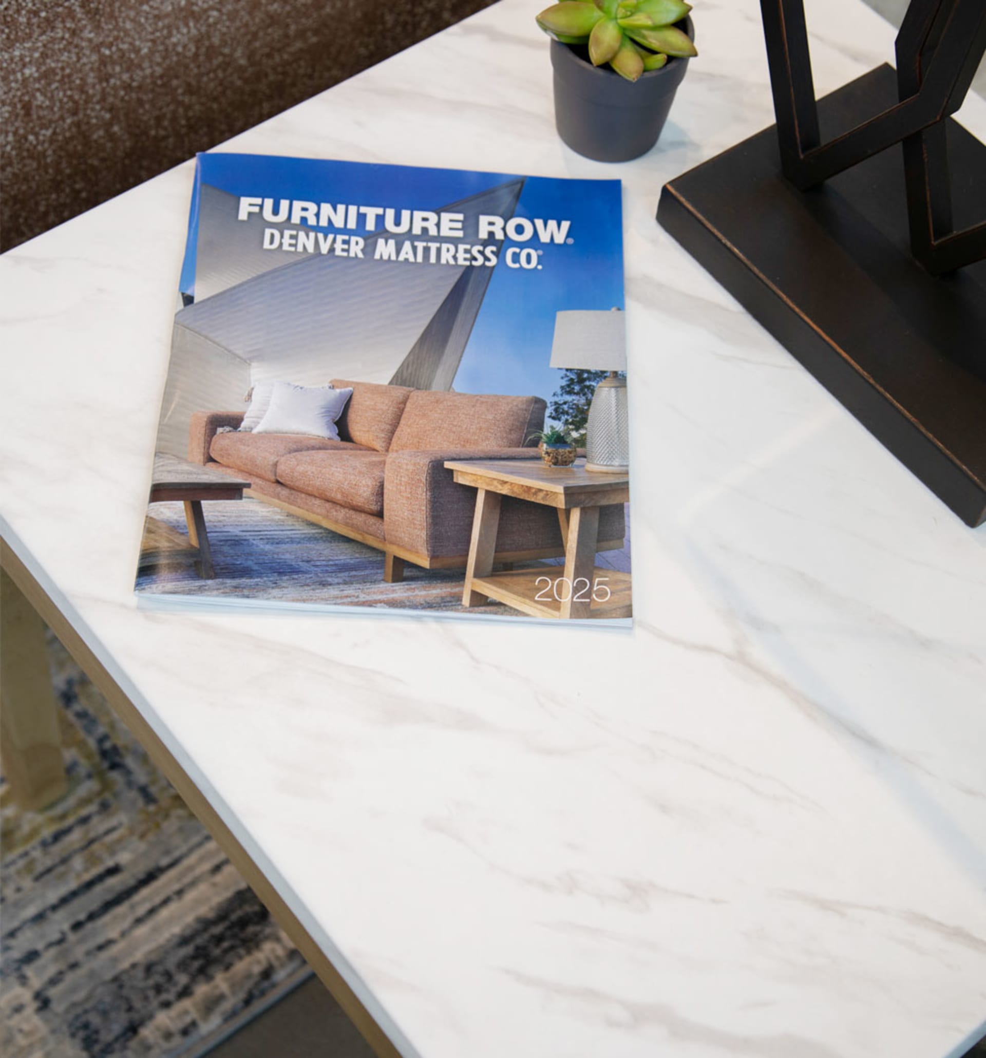 Annual Catalog on Side Table next to Sofa