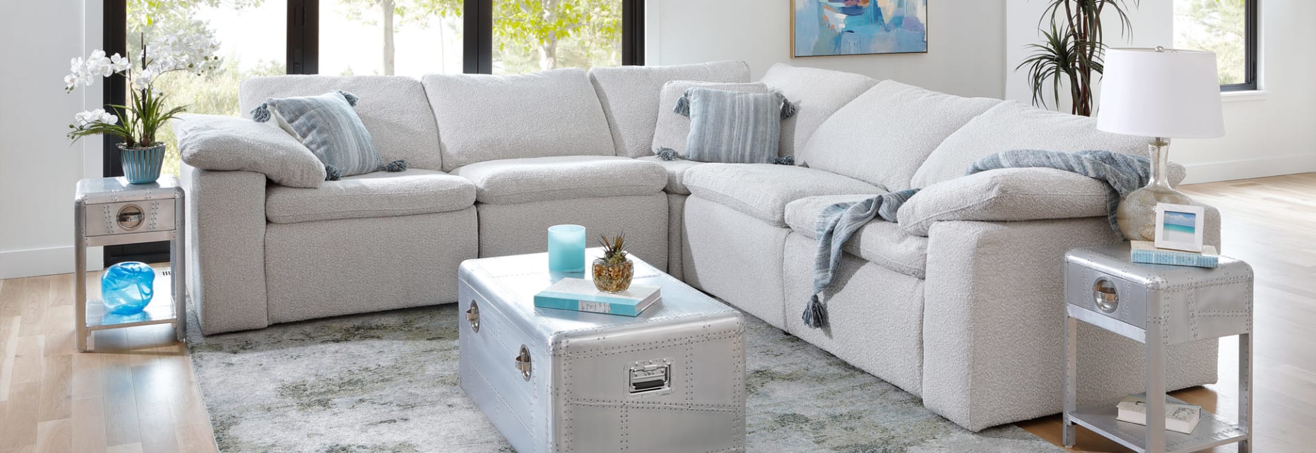 Light Gray Bouclé reclining sectional in living room