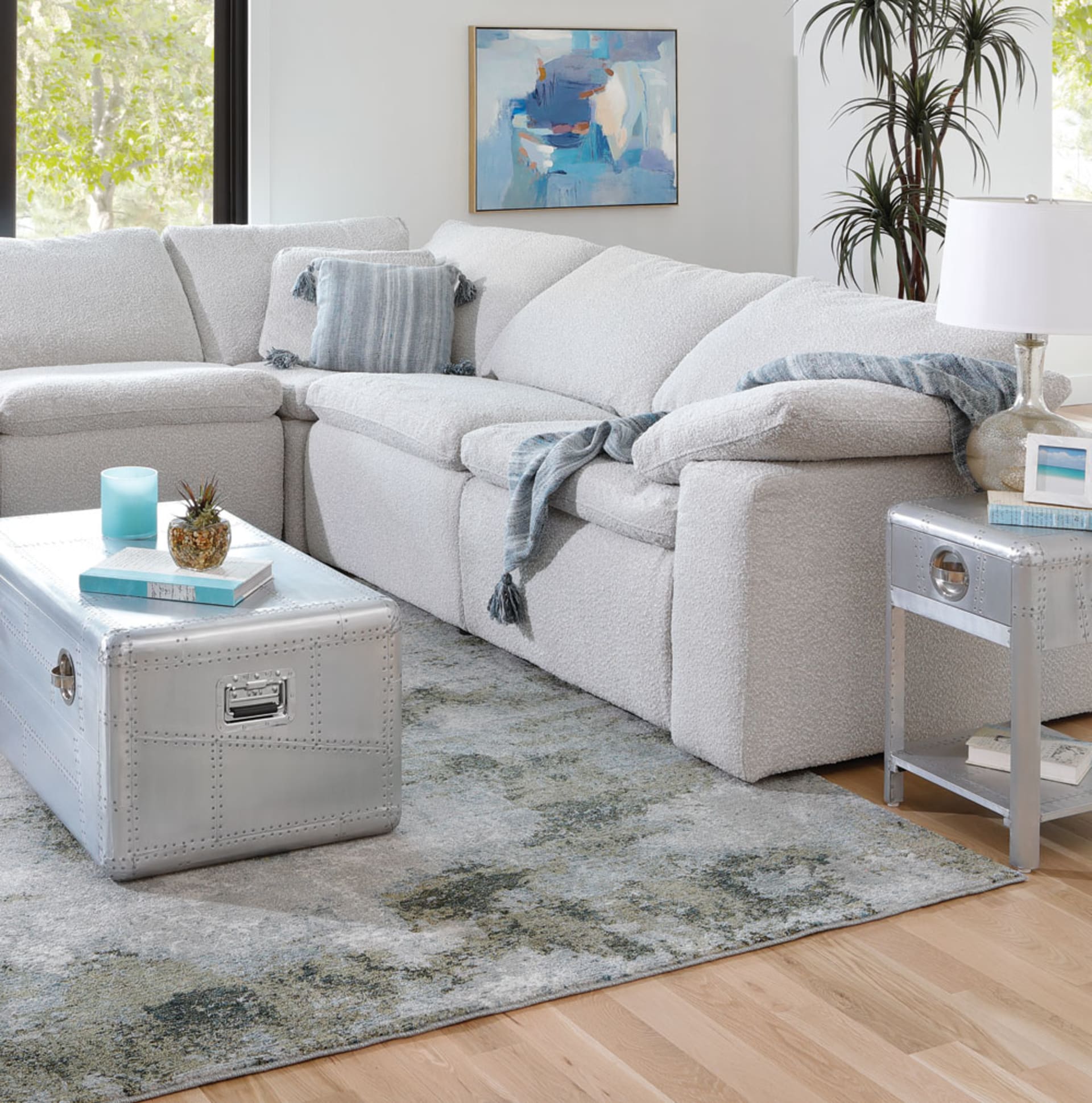 Light Gray Bouclé reclining sectional in living room