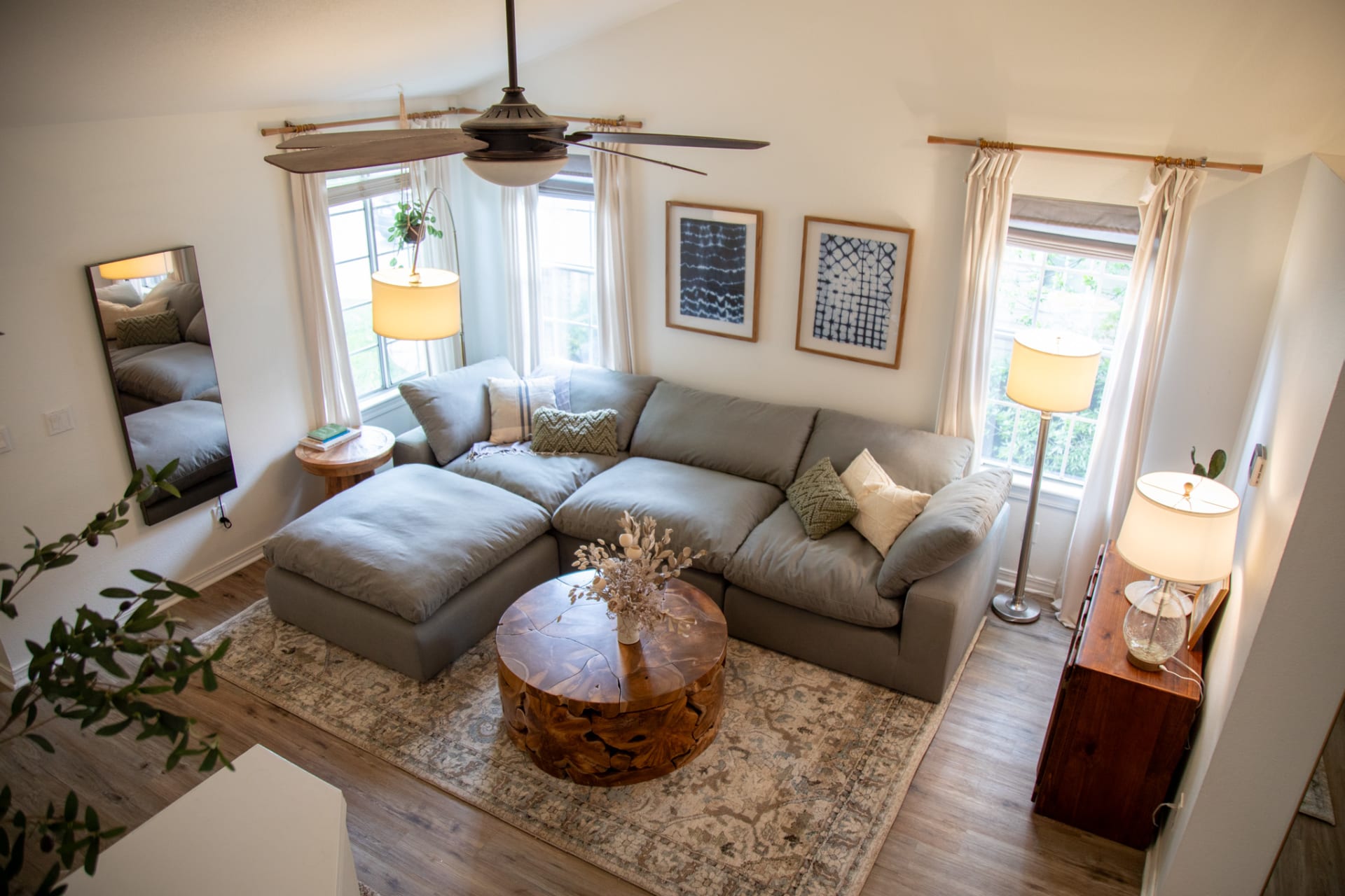 Overhead view of a modern organic living room with a comfy sectional