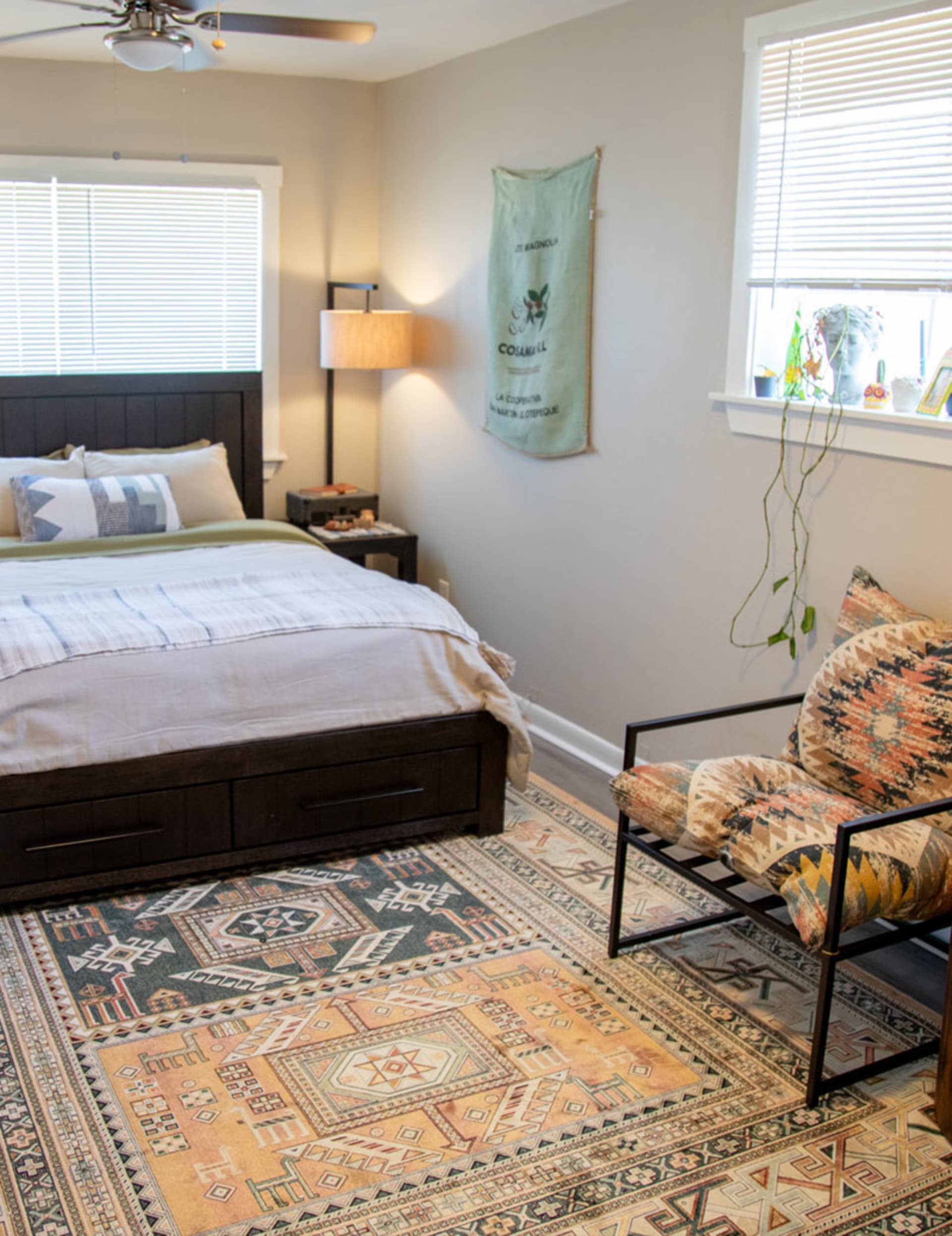 Dark Wooden Storage Bed in Eclectic Western Bedroom