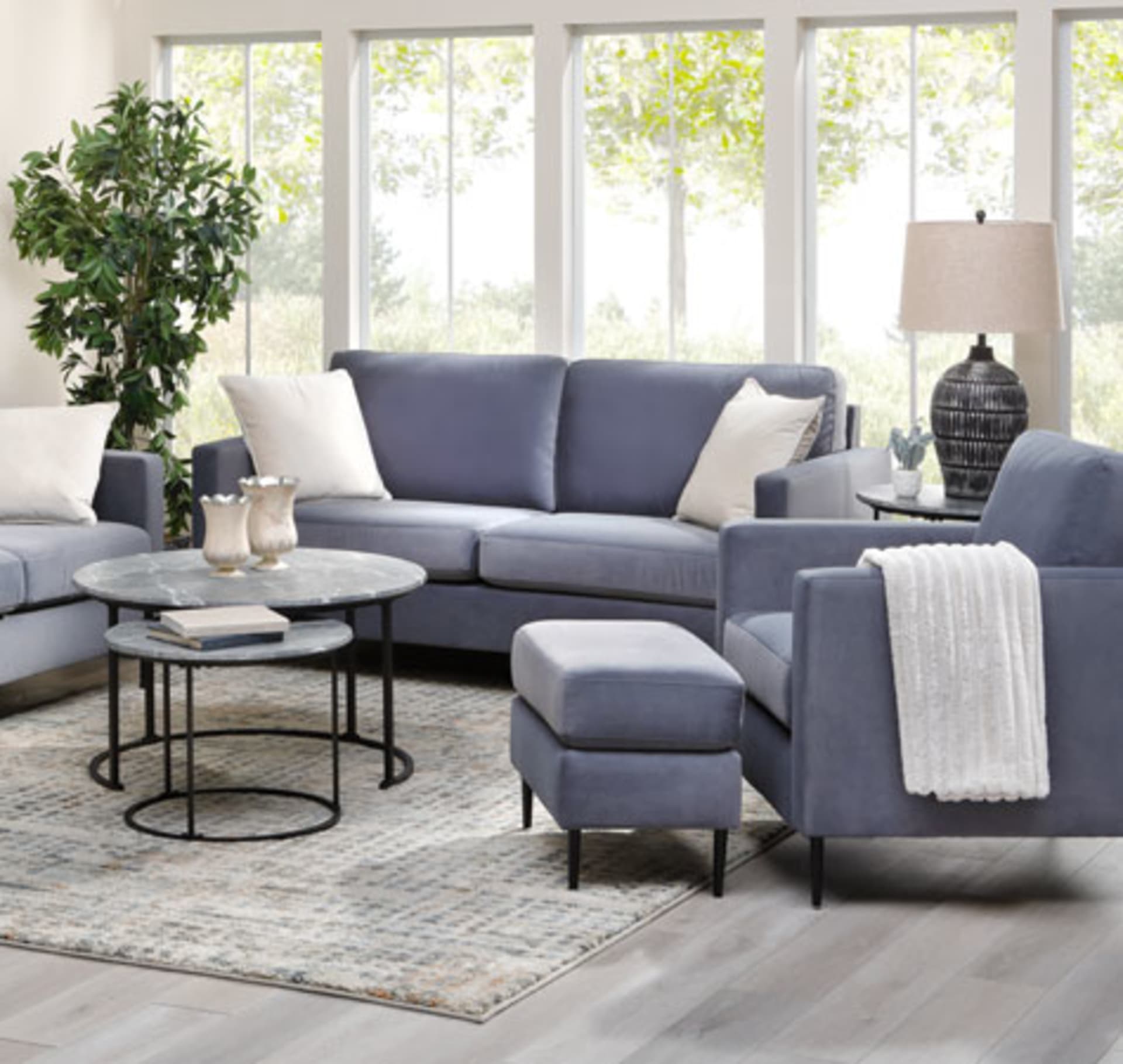 Slate Blue colored velvet sofa set in living room