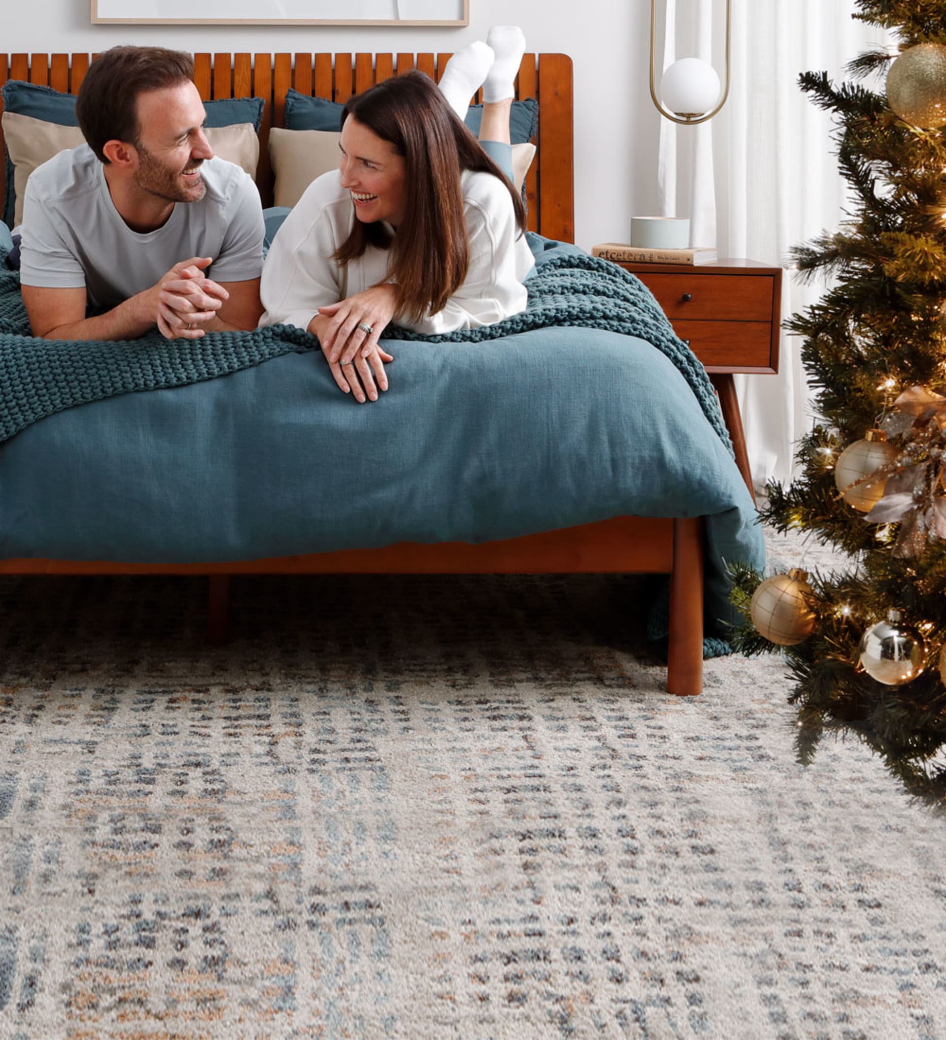 Couple in Christmassy Denver Mattress Room