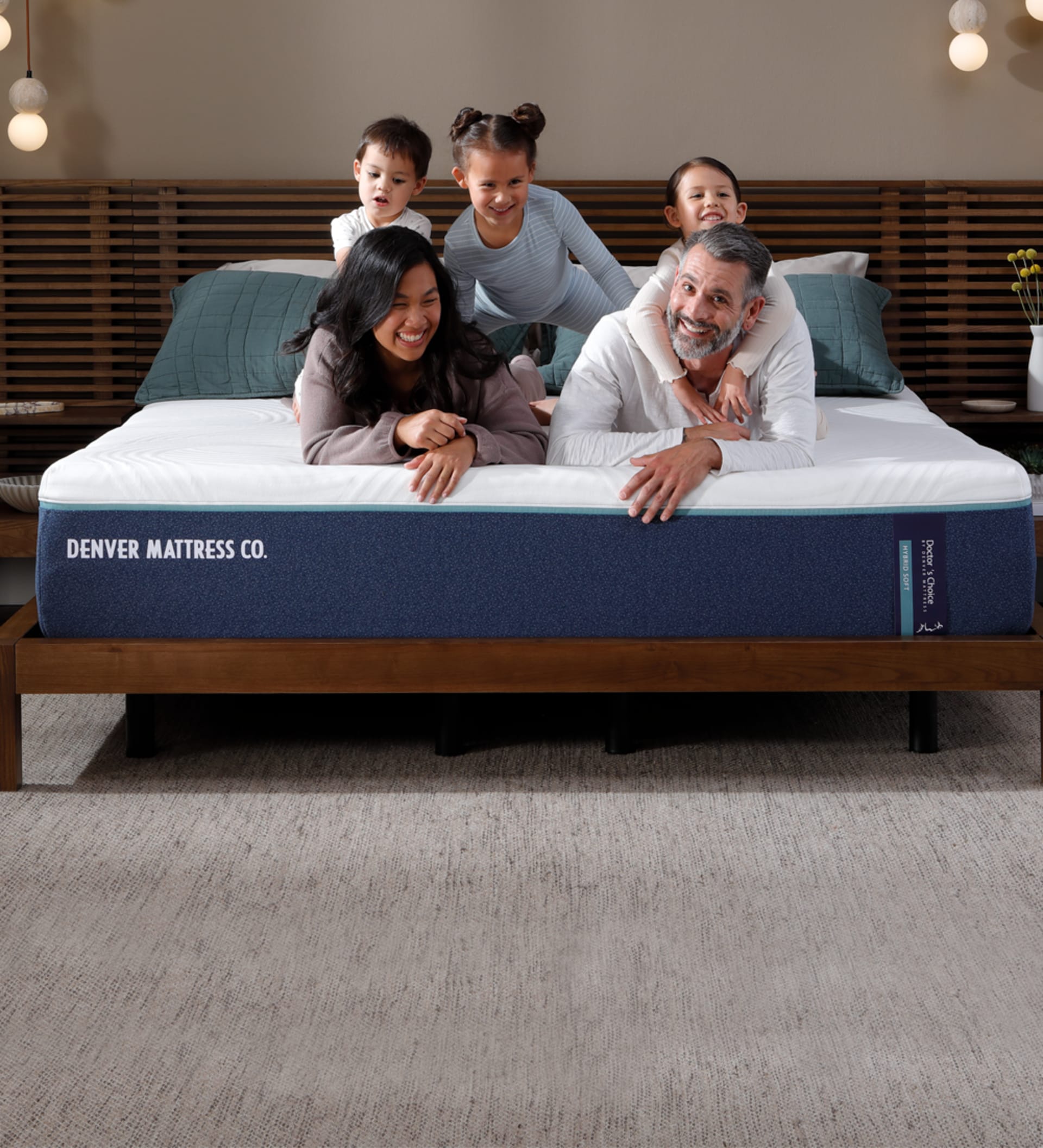 Family Laying on Doctors Choice Hybrid Soft Mattress