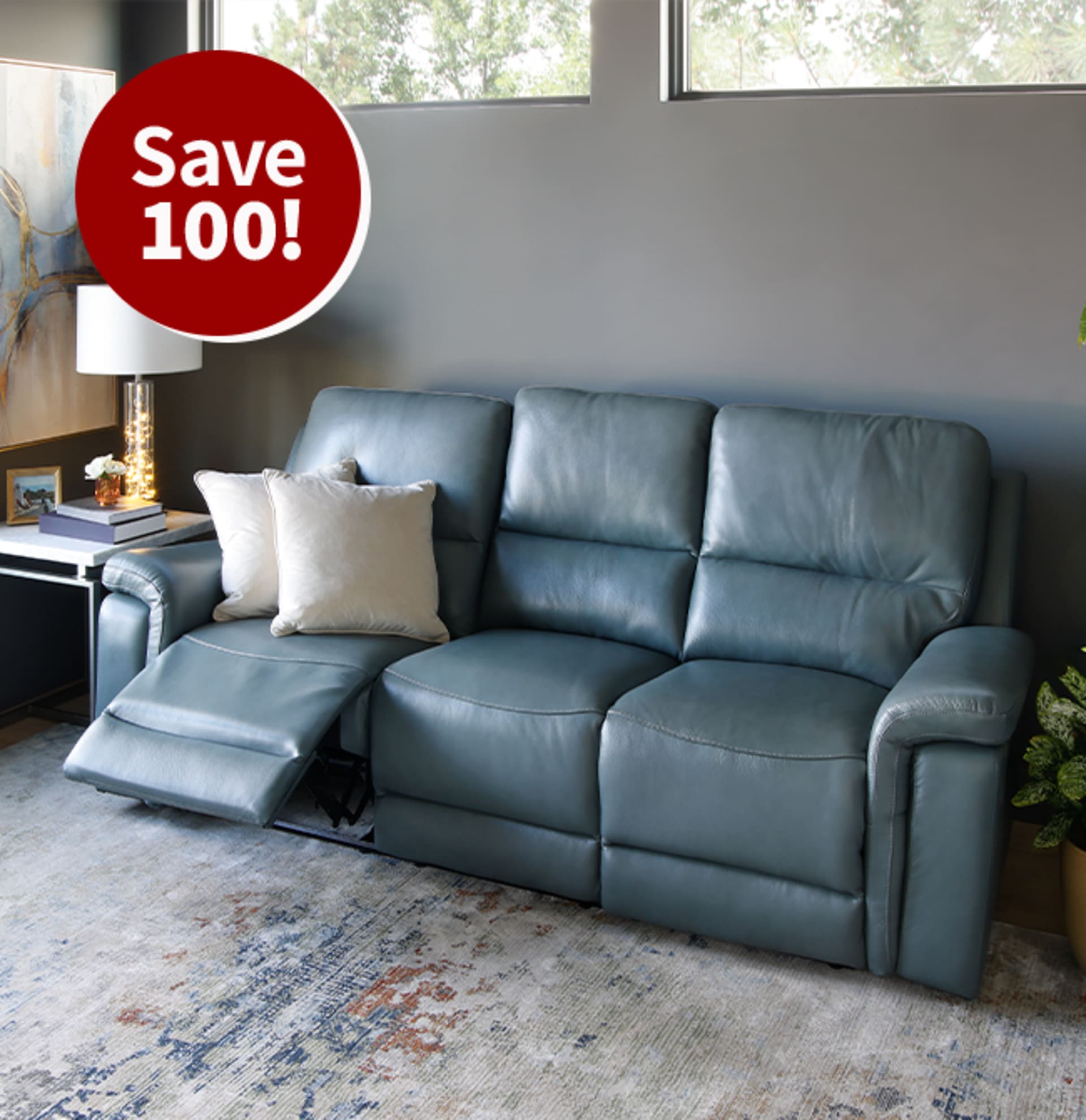 Royce Power Reclining Leather Sofa with Footrest Open and Pillows