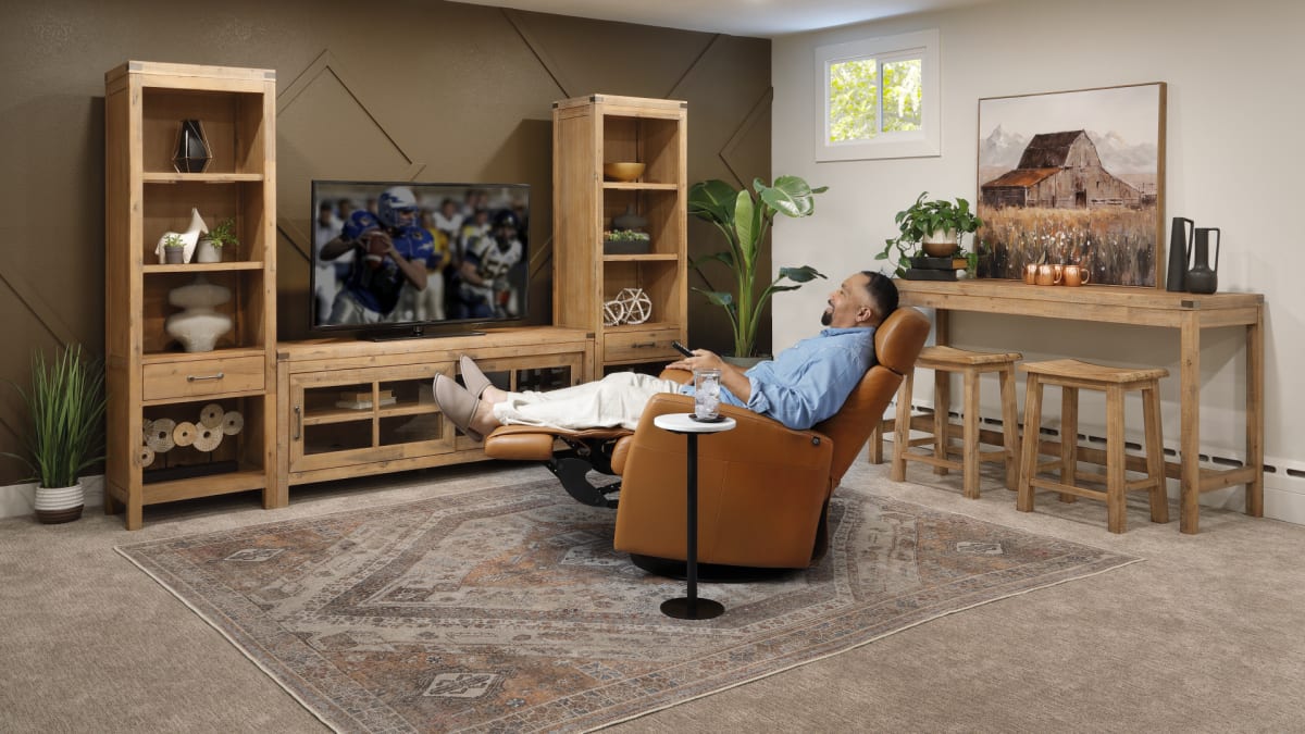 Light Wooden Entertainment Center with Recliner in Living Room