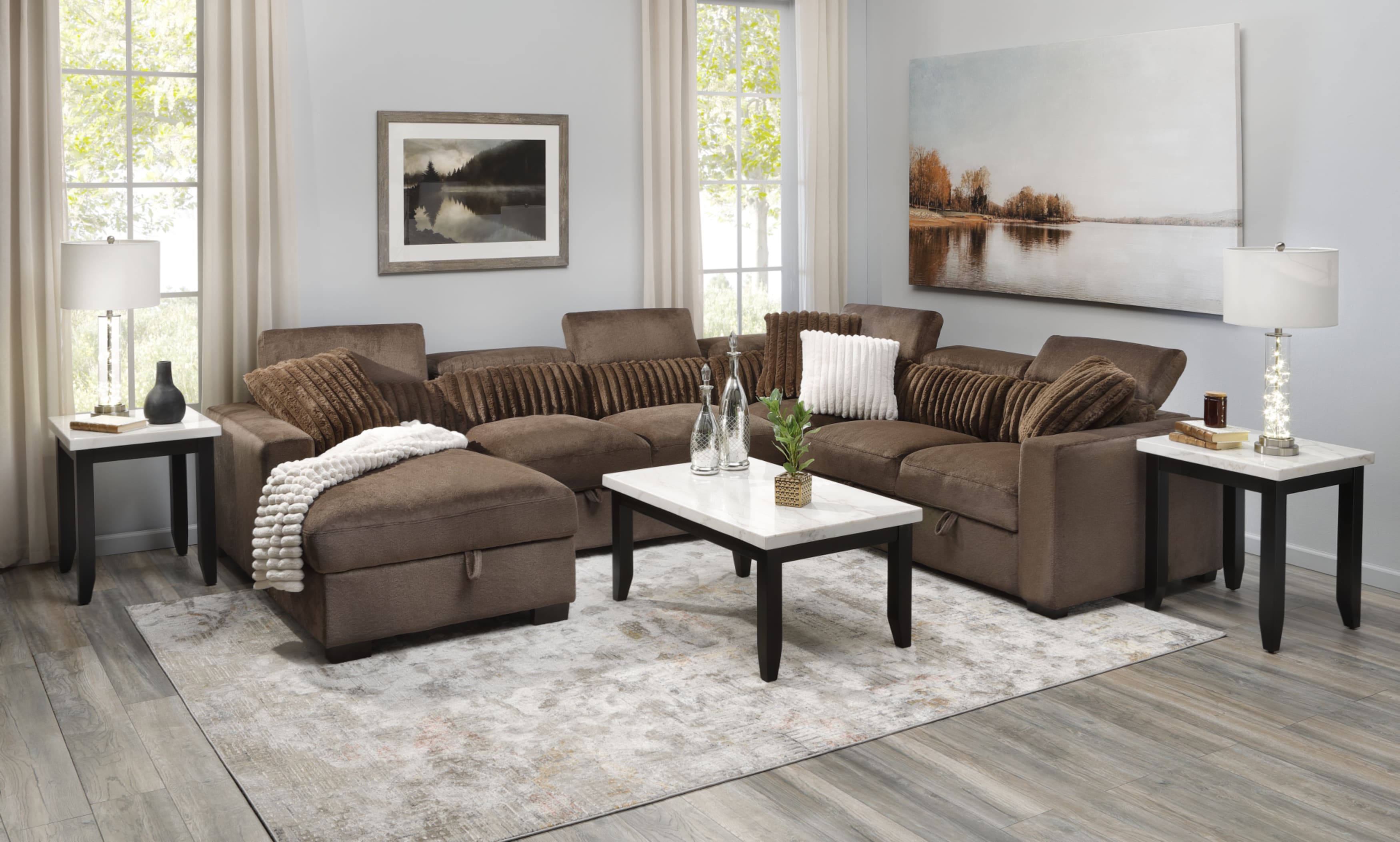 The Roxy Sleeper Sectional styled in living room window scene with Ivory Coffee Table and Ivory End Tables.